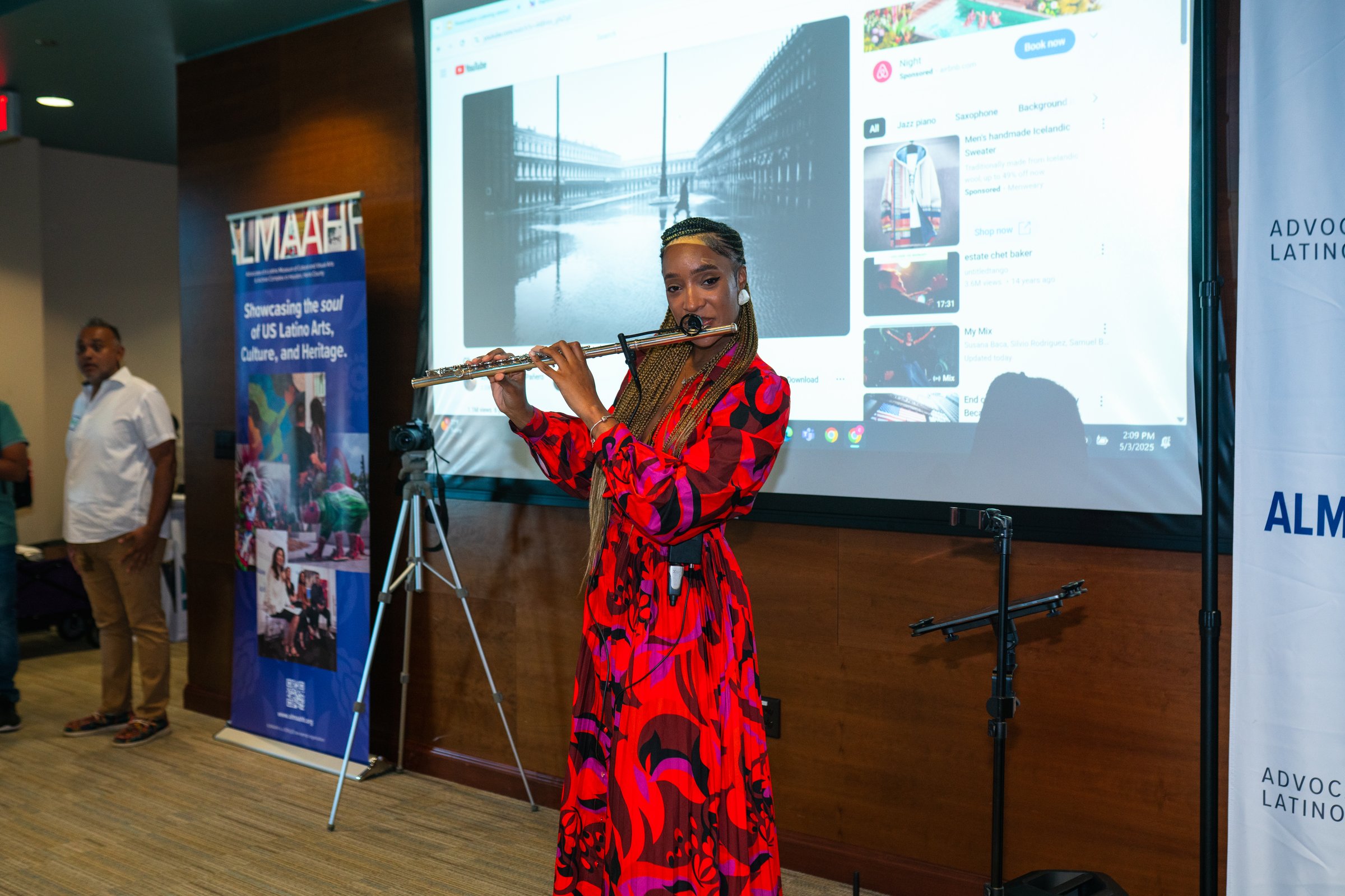 Yansa performing at an ALMAAHH visioning session — cultural arts moment